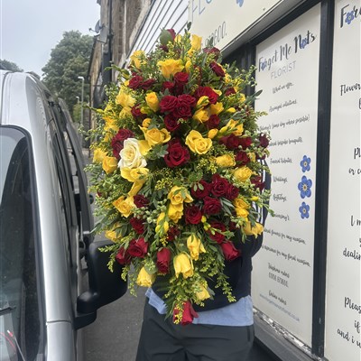 3 foot red and yellow casket spray 