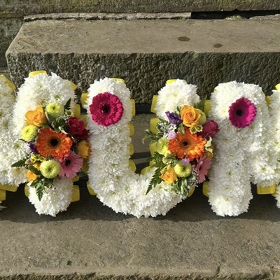 Mum in bright coloured design 