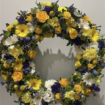 Yellow and purple seasonal wreath 