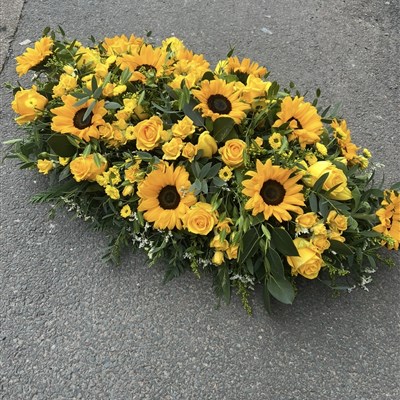 Sunflowers and yellow rose casket spray 